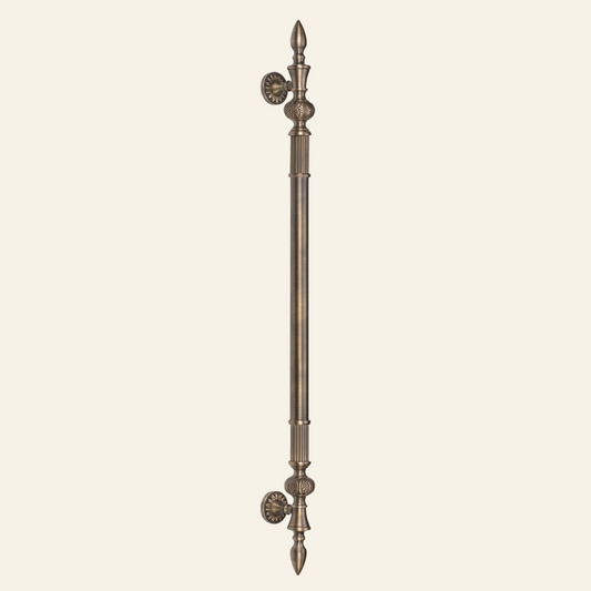 A Delphi brass main door pull handle with a center-to-center length of 750mm, featuring a traditional, elegant design.