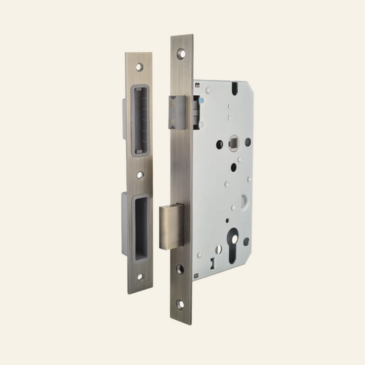Metal door lock mechanism on a white background