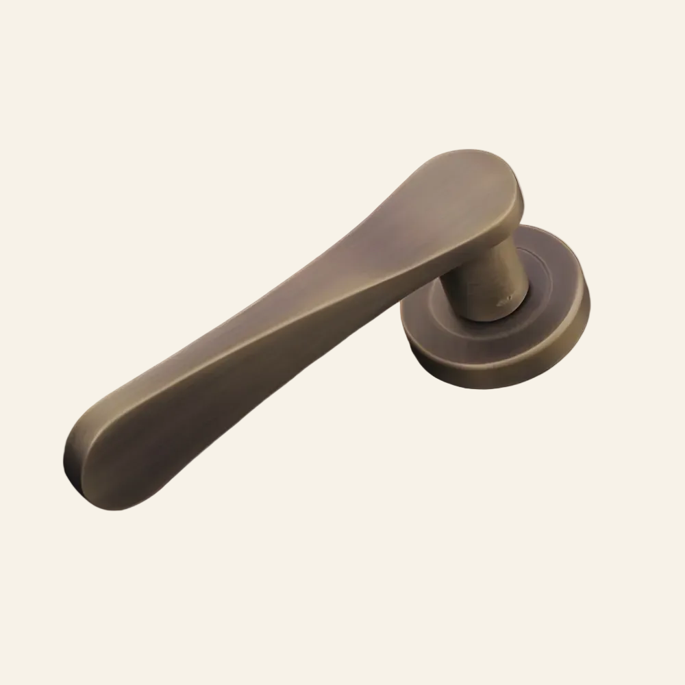 Bronze door handle on a dark background