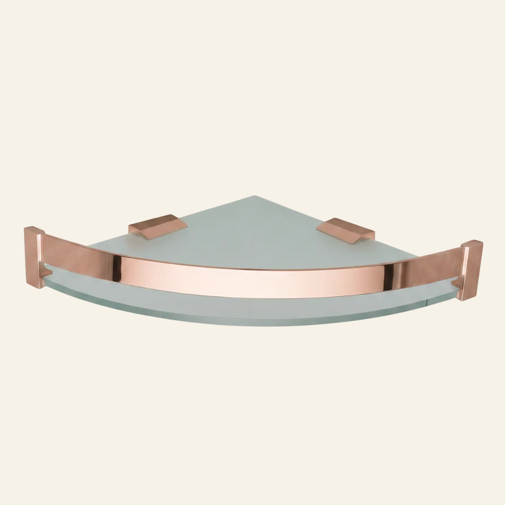 A triangular corner wall shelf made of frosted light gray glass with a polished rose gold metal frame and brackets, shown against a plain white background.