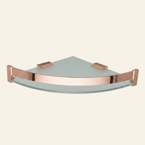 A triangular corner wall shelf made of frosted light gray glass with a polished rose gold metal frame and brackets, shown against a plain white background.