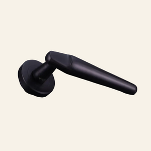 Black door handle on a dark background