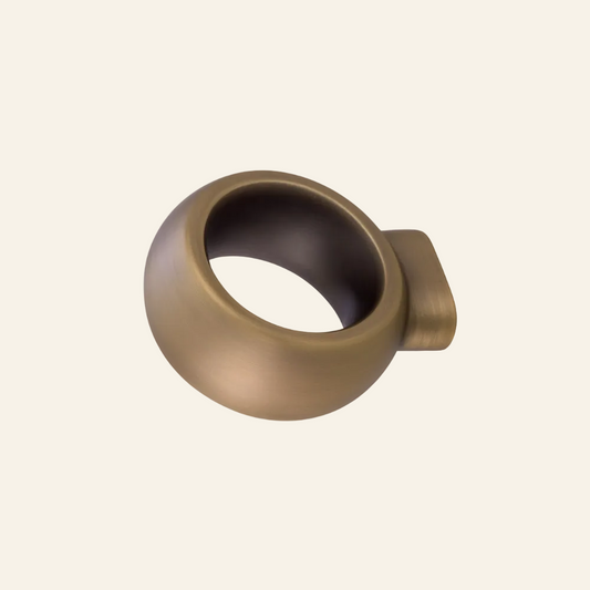 Bronze curtain rod bracket on a white background