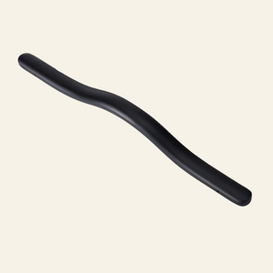 AceLine Ely black colored solid brass pull handle placed on a black textured surface.