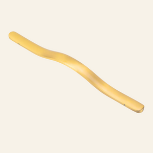 AceLine Ely gold-colored solid brass pull handle placed on a black textured surface.