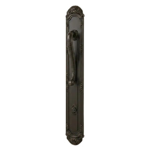Wooden door with decorative handle and glass panel