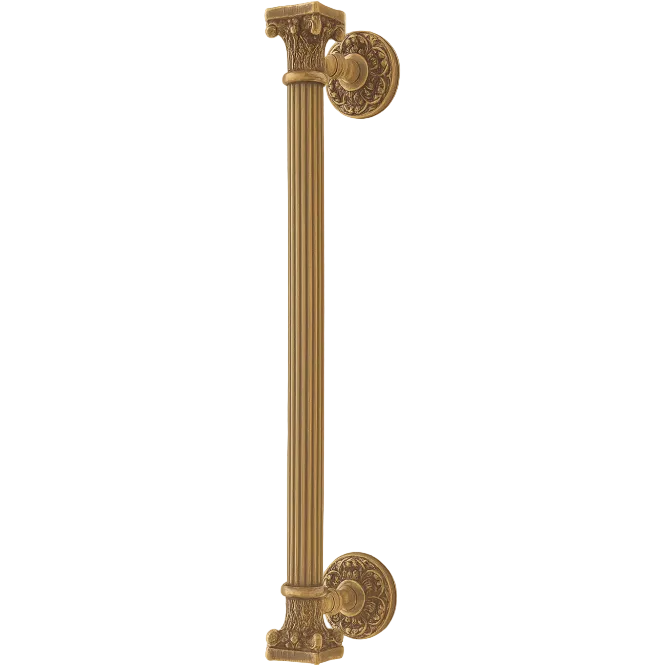 An ornate vertical cabinet pull handle with a fluted column design and decorative round mounts, shown in a warm antique gold/brass finish against a plain light beige background.
