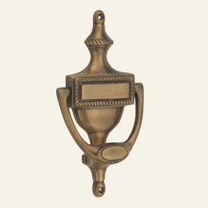 AceLine Decorative brass door knocker on a white background