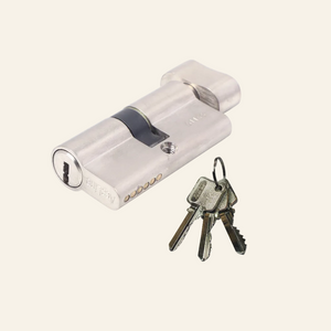 A black brass cylinder lock with a Euro profile, displayed alongside three metal keys.