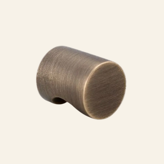 AceLine Riga single brass drawer knob with a smooth finish and a rounded, polished design.
