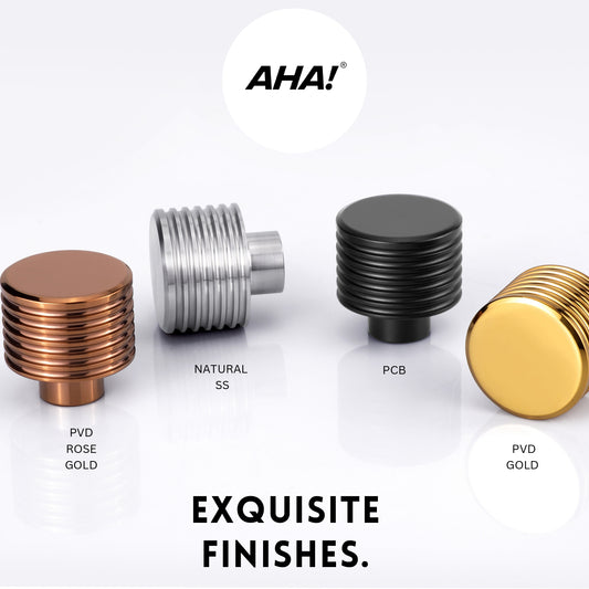 AceLine collection of stainless steel furniture knobs in various finishes including natural, PVD, satin, and gold, with the brand 'aha!' prominently displayed.
