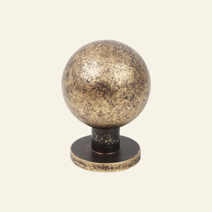 AceLine Milton  solid brass drawer knob with a round spherical design and a dark corrosion-resistant finish.