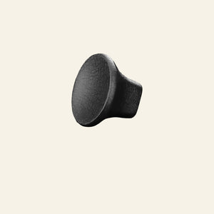 AceLine reno bronze-colored brass drawer knob isolated on a black background.